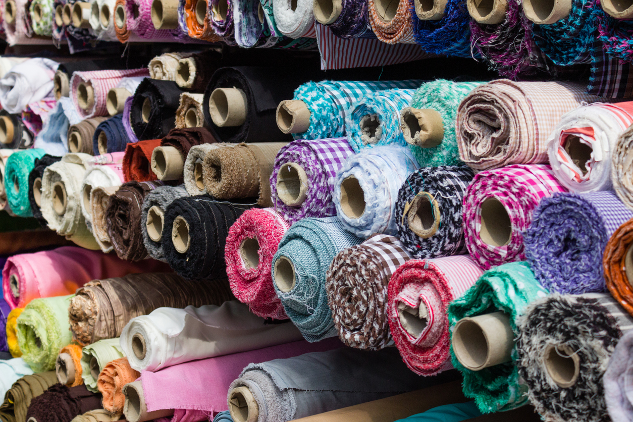 Rolls of cotton fabric by hanohiki via iStock